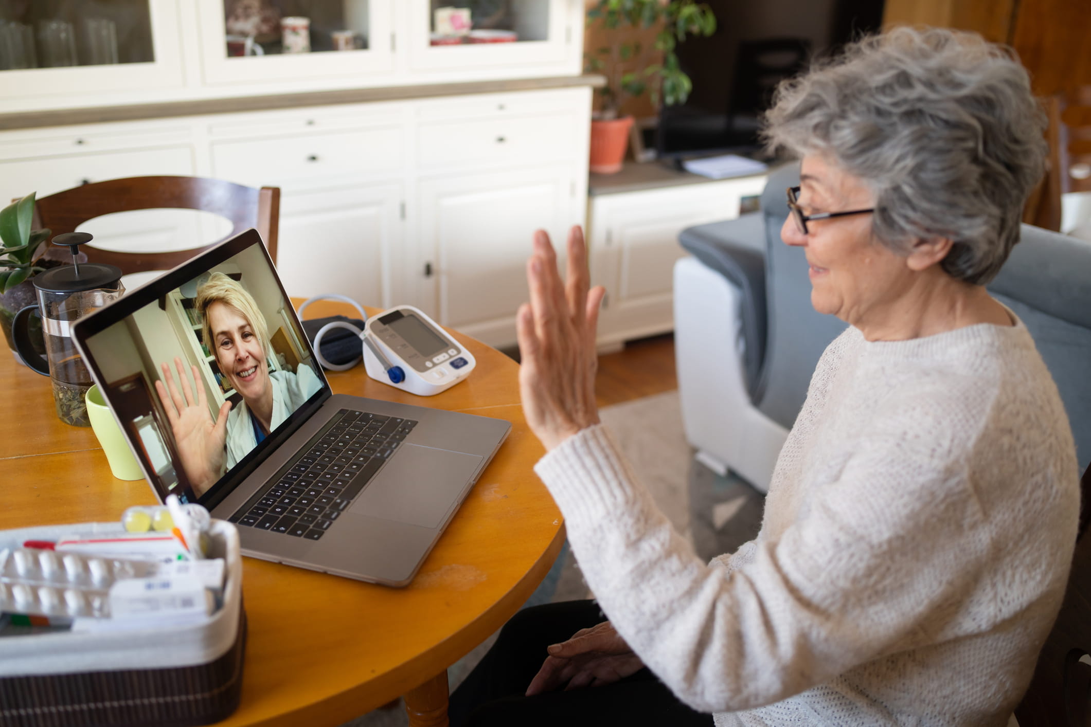 virtual doctor appointment with patient and laptop
