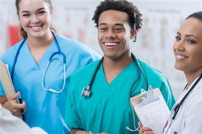 Group of hospital workers conversing