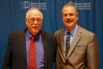 David Long (left) with attendee at the 2017 Brain Injury Association of Pennsylvania’s Annual Conference