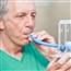 Man performing lung capacity test