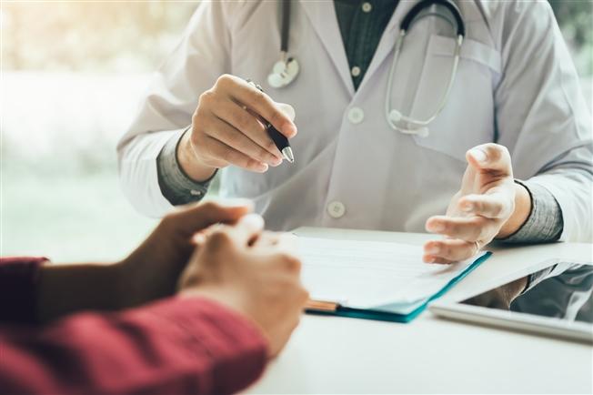 Doctor talking to patient Doctor talking to patient