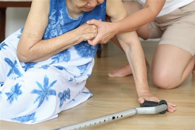 Elderly woman falling at home