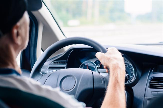 Man driving in car