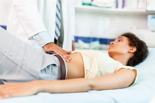Young patient being examined by doctor