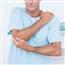 Man holding elbow