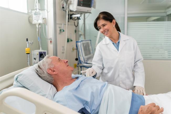 Doctor caring for patient Doctor caring for patient