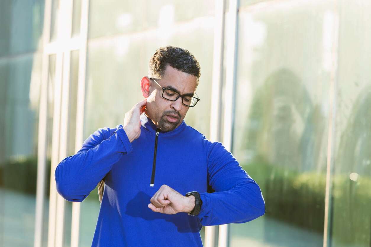 Man checking pulse