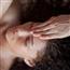 Woman receiving alternative therapy