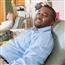 Man giving blood at hospital
