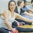 Pregnant woman stretching before exercise