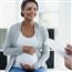 Pregnant woman in doctor's office