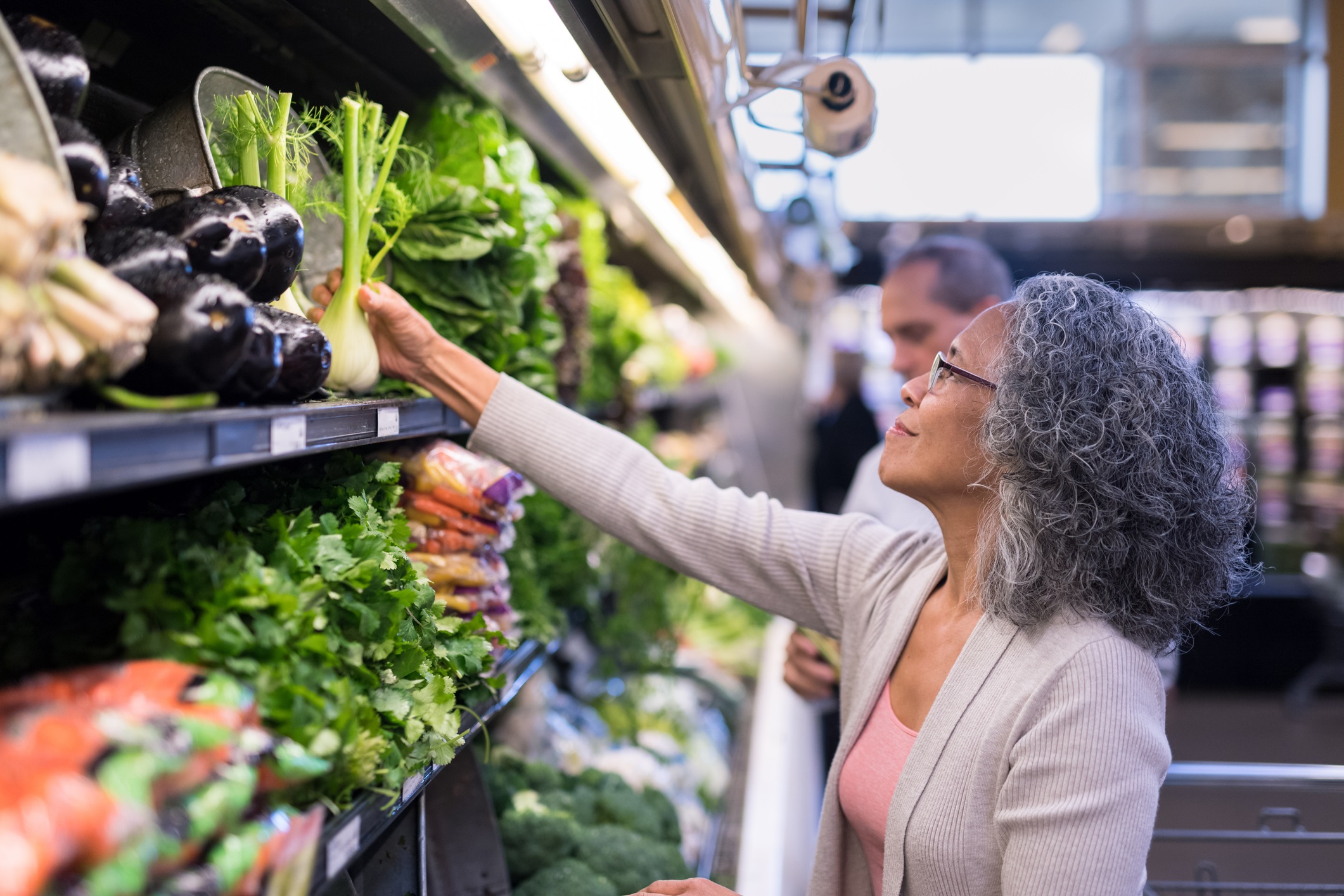 Woman choosing produce