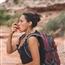 Person using inhaler while hiking