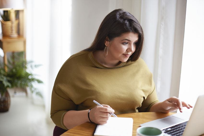 Woman doing research on computer
