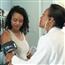 Woman getting blood pressure screened