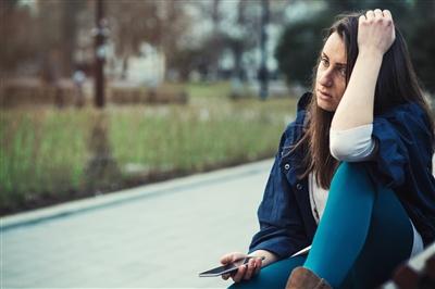 Woman looking stressed Woman looking stressed