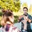 Deaf person communicating using sign language with seethrough mask