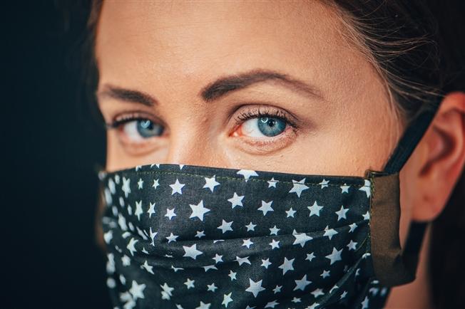 Close up of womans eyes above her COVID19 mask