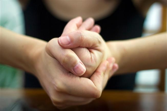 Close up of woman cracking her knuckles