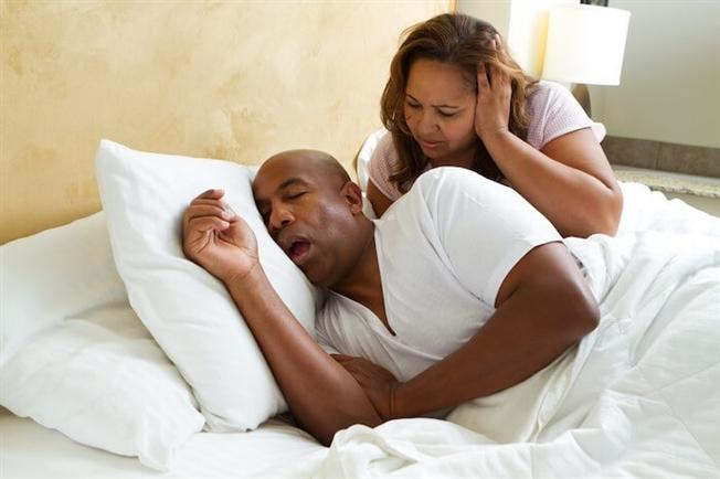 snoring Wife woken up by husband’s sleep apnea and snoring
