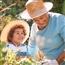 Grandmother and child gardening outdoors