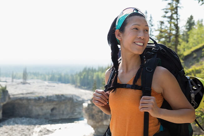 young woman backpacking