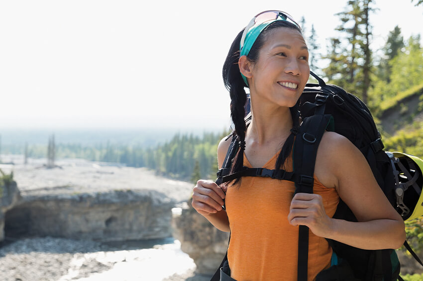 young woman backpacking