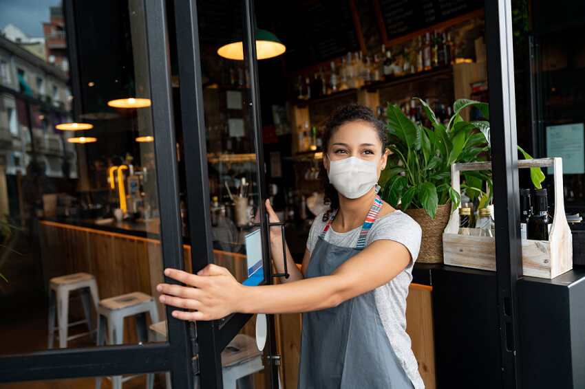 Woman opening up restaurant