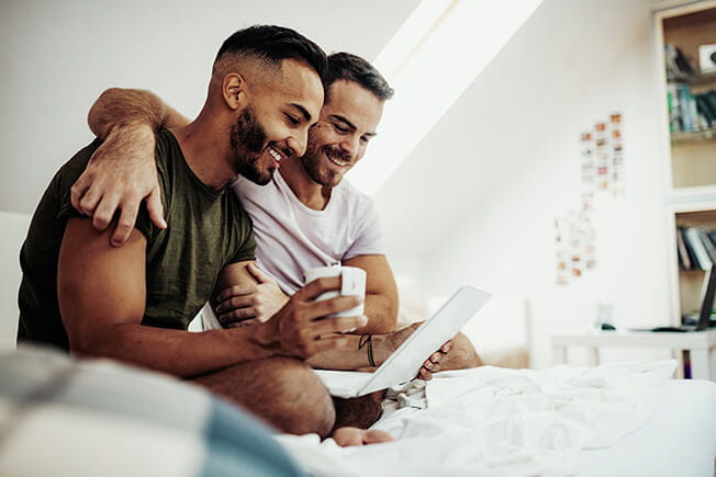 Healthy male couple at home