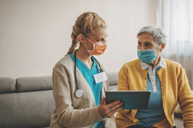 Doctor discussing patient health with patient