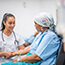 Patient and clinician during immunotherapy infusion