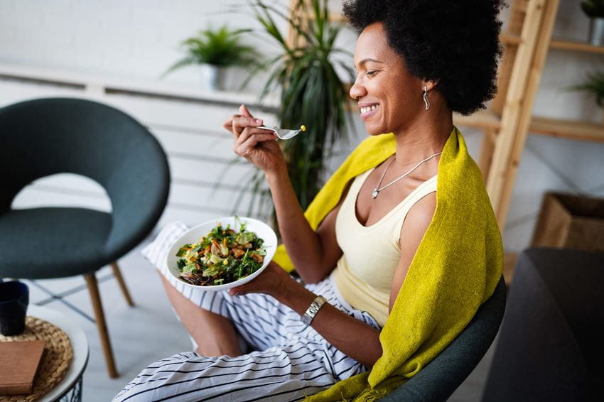 woman enjoying a nutritious salad