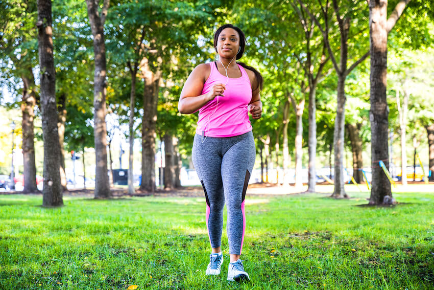 Woman jogging in urban park