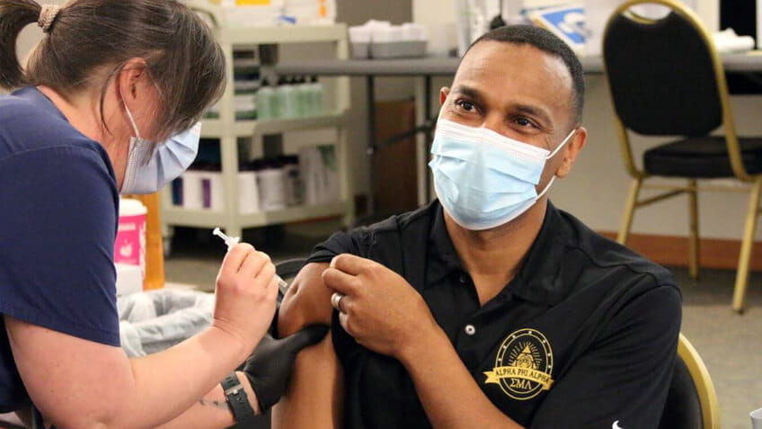 Dr. Joseph Gobern receiving COVID vaccination