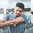man with elbow pain