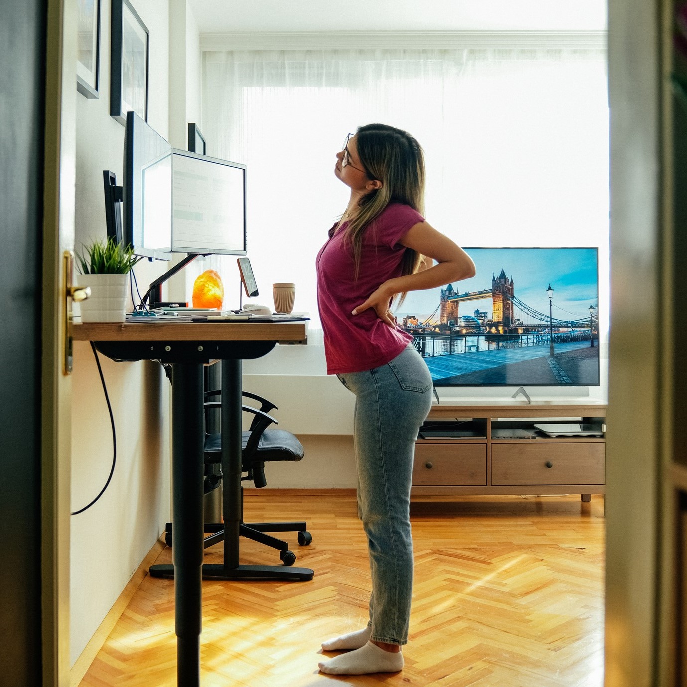 woman holding back