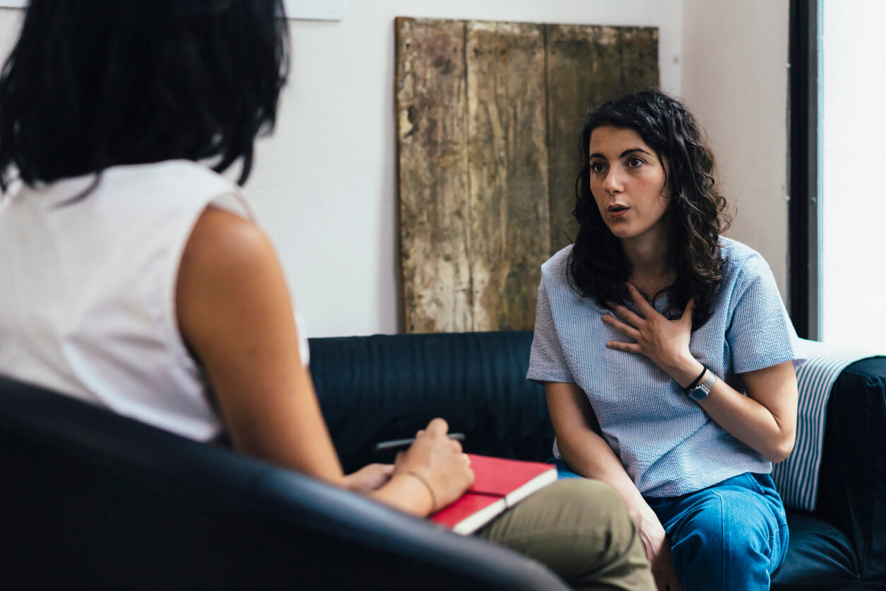 Woman speaking to therapist in therapy session