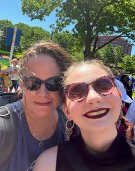 Courtney and Zoey at a Pride event