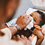 Sick, ill and unwell little boy suffering from cold, flu or covid