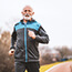 Senior man running outdoors.
