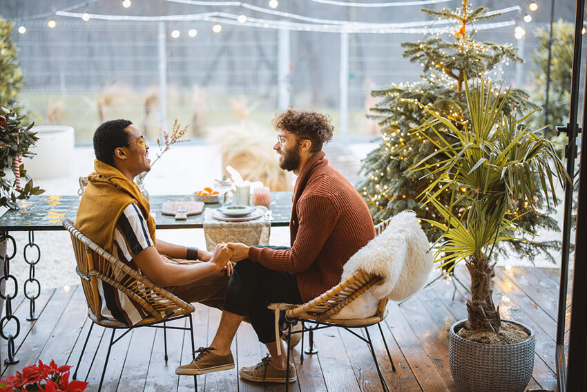 Two men sitting at a table together.