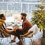 Two men sitting at a table together.