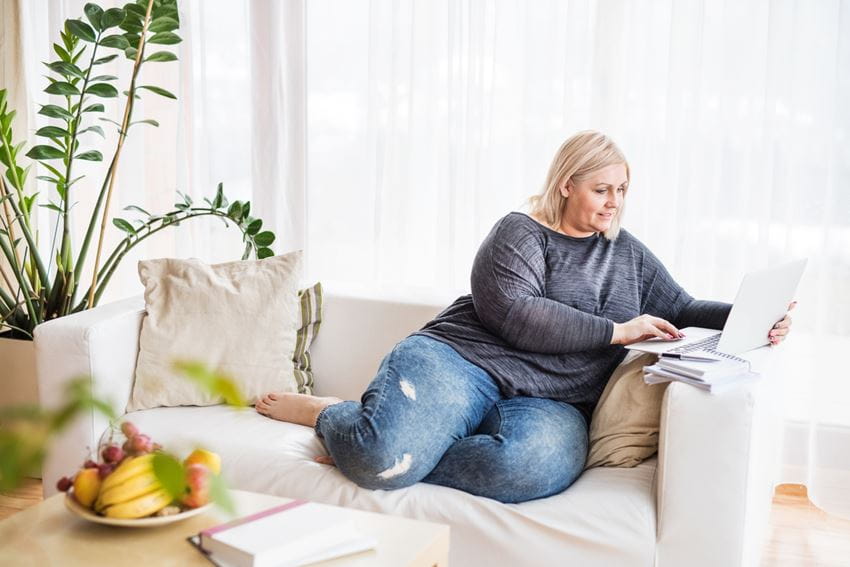 woman at home using laptop