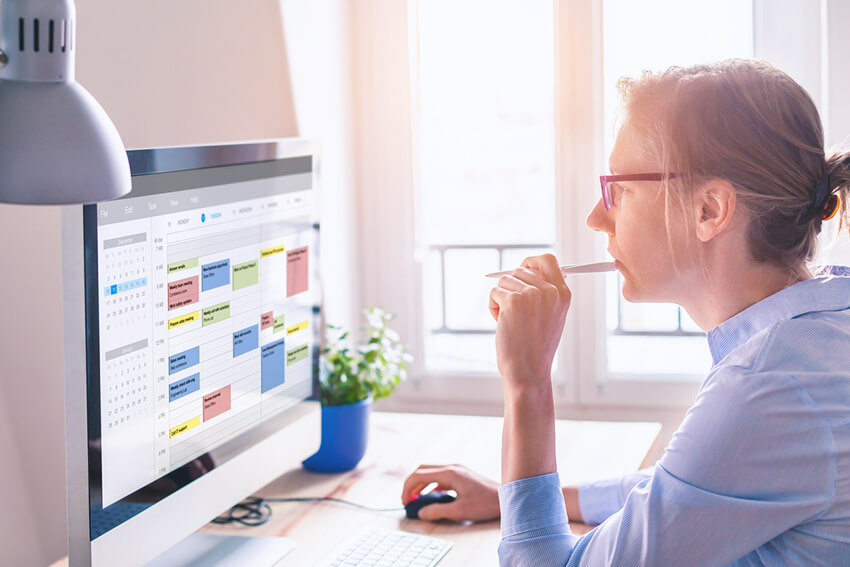 Person using calendar on computer