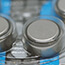 Close up of button batteries in device