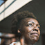 Senior woman looking through the window