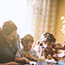Multi-generational family having dinner.