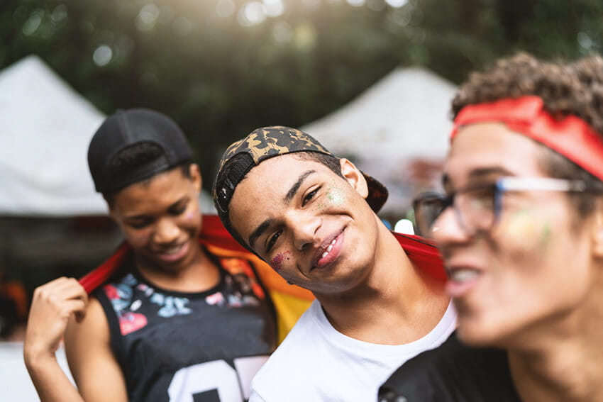 Group of friends celebrating at an event.
