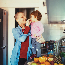 Woman making a healthy breakfast with her daughter.