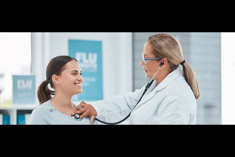doctor examining a patient with a stethoscope